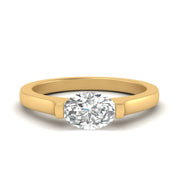half-bezel-oval-shaped-diamond-engagement-ring-in-yellow-gold-FDENR7239OVR-NL-YG